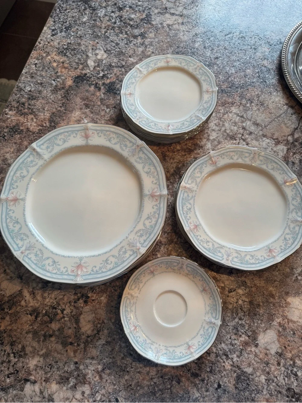 Noritake Crown Flower Dinnerware with Pale Blue and Soft Pink Floral Border